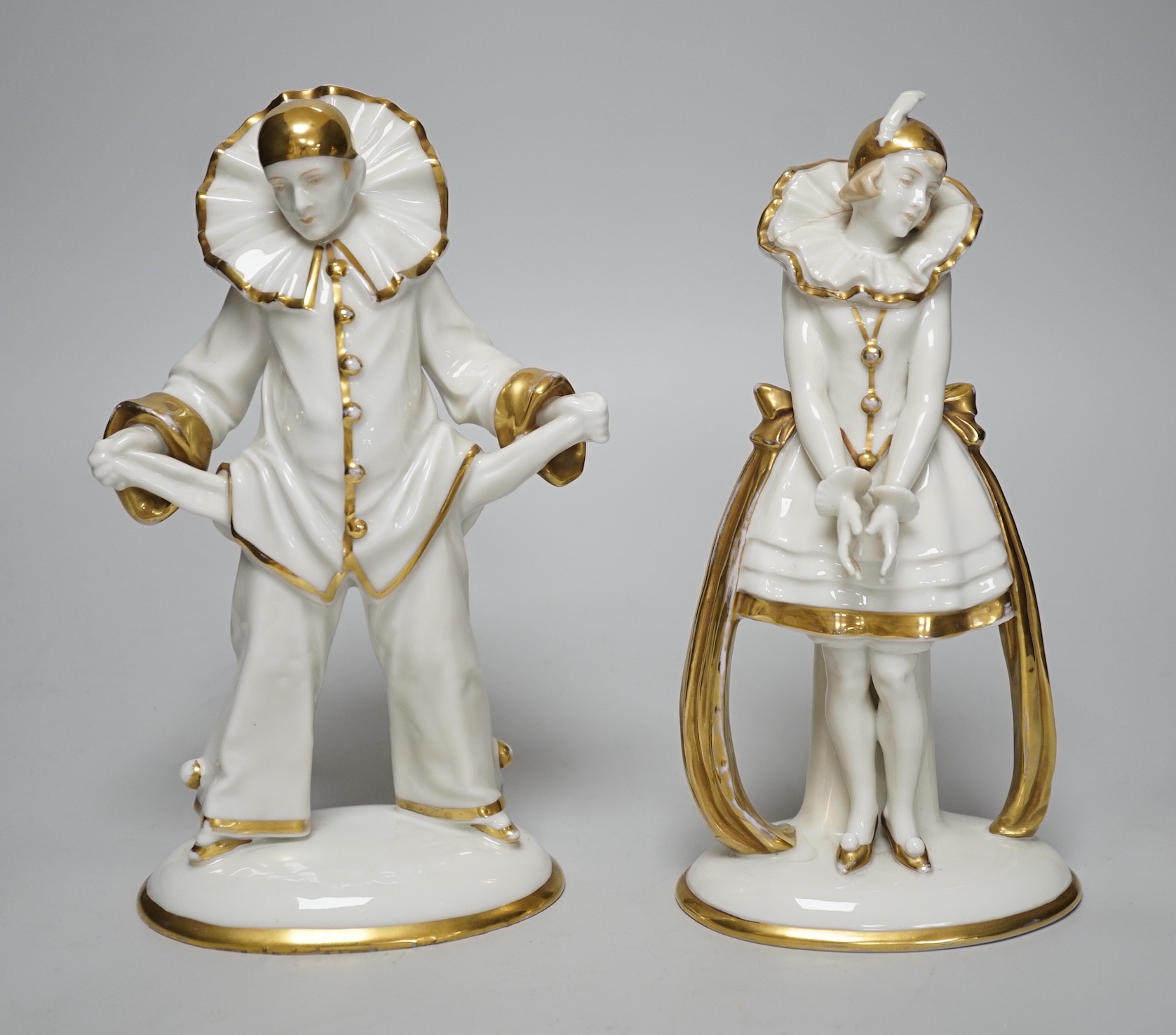 A pair of Sitzendorf Art Deco Pierrot figures, tallest 23cms high